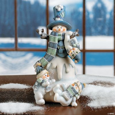 Snowman with Three Snow Kids