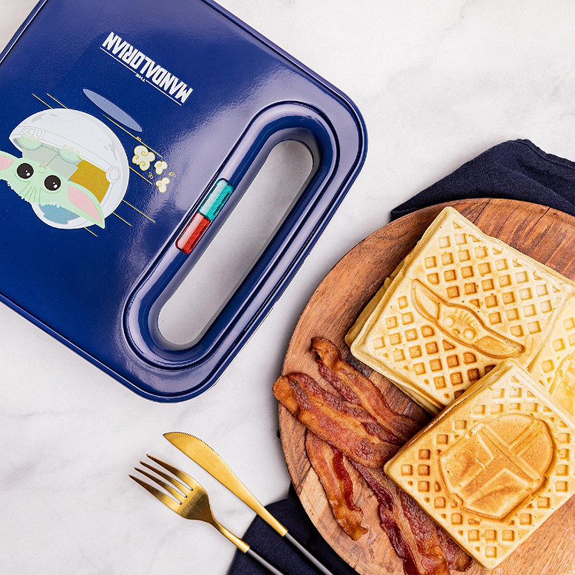 Uncanny Brands Mandalorian Waffle Maker - Bounty Hunter & Baby Yoda Waffles - Star Wars Kitchen Appliance Image