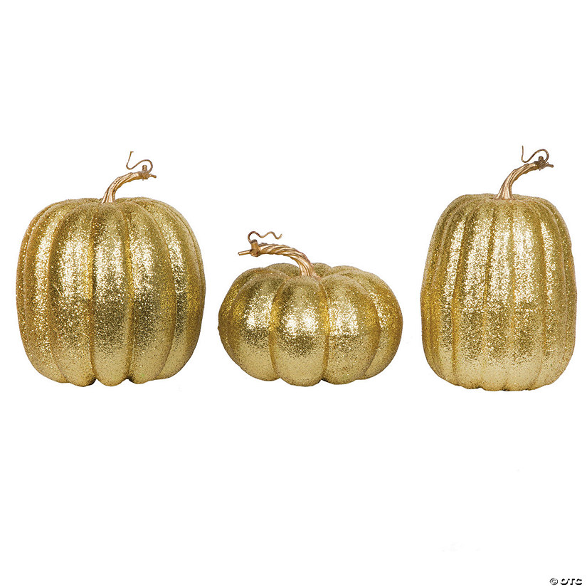 Vickerman 8" Gold Pumpkins Assorted Set of 3. Three pieces assorted, sizes: 9"(W) x 8"(H),7.5"(W) x 8"(H), 6.25"(W) x 8"(H). Fabric pumpkin with styrofoam inner. Image