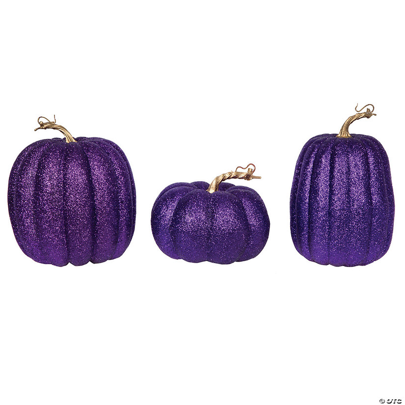 Vickerman 8" Purple Pumpkins Assorted Set of 3. Three pieces assorted, sizes: 9"(W) x 8"(H),7.5"(W) x 8"(H), 6.25"(W) x 8"(H). Fabric pumpkin with styrofoam inner. Image