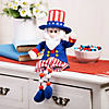 12 1/2" Dangle-Leg Patriotic Uncle Sam Tabletop Decoration Image 1