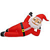 National Tree Company First Traditions&#8482; 12 ft. Inflatable Relaxing Santa Image 1