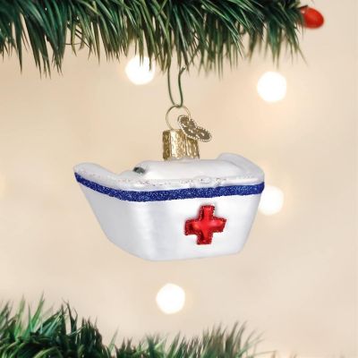 Old World Christmas #36146 Glass Blown Nurse Cap Ornament, 4.25 Image 1
