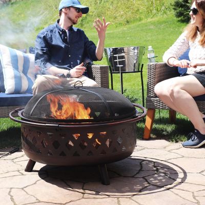 Sunnydaze Outdoor Camping or Backyard Crossweave Cut Out Fire Pit with Spark Screen, Log Poker, and Metal Wood Grate - 36" - Bronze Image 3