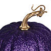 Vickerman 8" Purple Pumpkins Assorted Set of 3. Three pieces assorted, sizes: 9"(W) x 8"(H),7.5"(W) x 8"(H), 6.25"(W) x 8"(H). Fabric pumpkin with styrofoam inner. Image 1