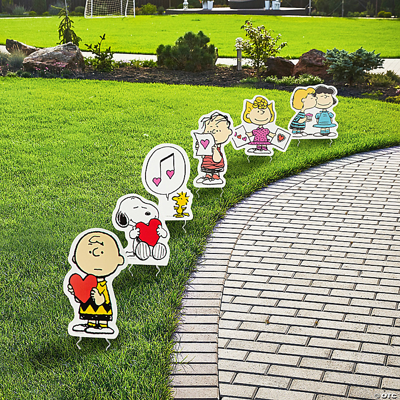 https://s7.orientaltrading.com/is/image/OrientalTrading/FXBanner_808/15-1-2-15-3-4-peanuts-sup----sup-valentine-s-day-yard-signs-6-pc-~14095570.jpg