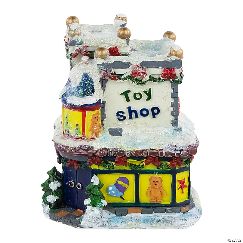 https://s7.orientaltrading.com/is/image/OrientalTrading/FXBanner_808/4-glittered-snowy-toy-shop-christmas-village-building~14432482.jpg