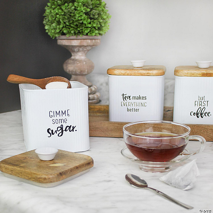 https://s7.orientaltrading.com/is/image/OrientalTrading/FXBanner_808/auldhome-farmhouse-white-enamelware-canisters-set-of-3-storage-containers-for-coffee-tea-and-sugar-in-white-enamel-and-wood-design~14372963-a01.jpg