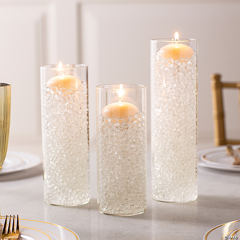 https://s7.orientaltrading.com/is/image/OrientalTrading/FXBanner_808/cylinder-vases-with-floating-candles-decorating-kit-39-pc-~14106287.jpg