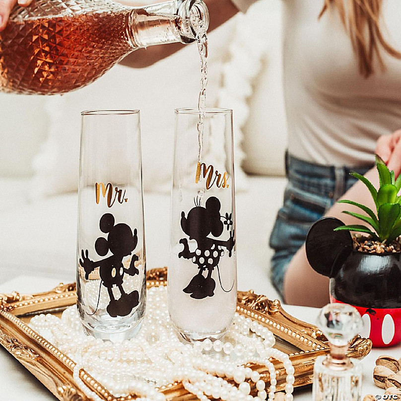 https://s7.orientaltrading.com/is/image/OrientalTrading/FXBanner_808/disney-mickey-and-minnie-9-ounce-stemless-fluted-glassware-set-of-2~14257690-a01.jpg