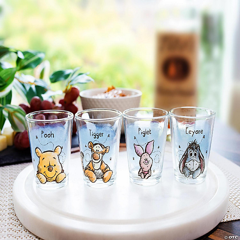 https://s7.orientaltrading.com/is/image/OrientalTrading/FXBanner_808/disney-winnie-the-pooh-character-portraits-2-ounce-mini-shot-glasses-set-of-4~14333234-a01.jpg