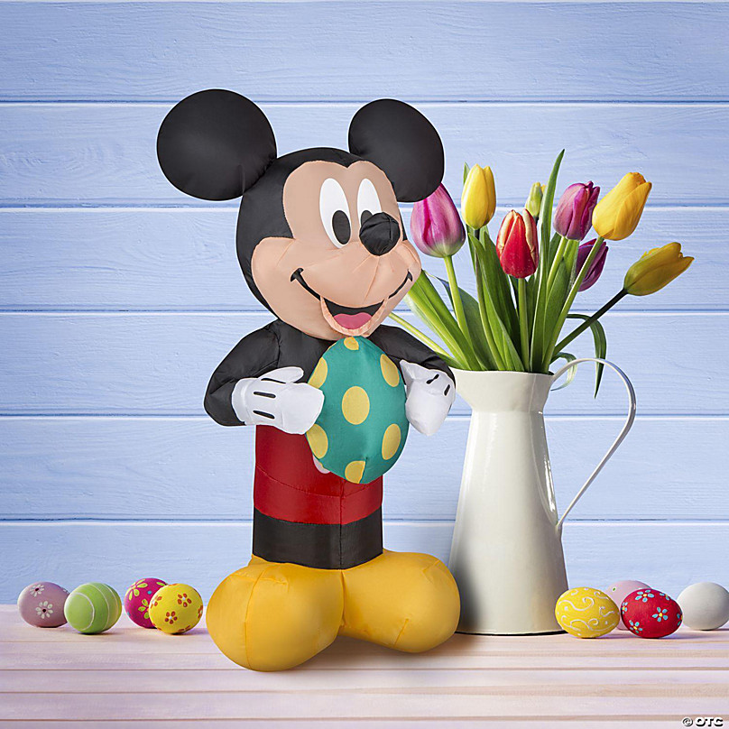 https://s7.orientaltrading.com/is/image/OrientalTrading/FXBanner_808/gemmy-airdorable-airblown-easter-mickey-mouse-with-egg-disney-1-5-ft-tall-black~14240524-a03.jpg