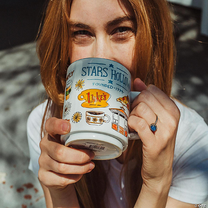 https://s7.orientaltrading.com/is/image/OrientalTrading/FXBanner_808/gilmore-girls-stars-hollow-allover-icons-ceramic-stacking-mug-holds-13-ounces~14260106-a03.jpg