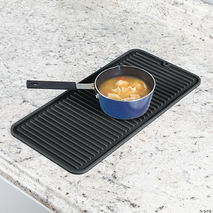 https://s7.orientaltrading.com/is/image/OrientalTrading/FXBanner_808/mdesign-silicone-kitchen-counter-dish-drying-mat-and-protector-small-black~14238344-a03.jpg