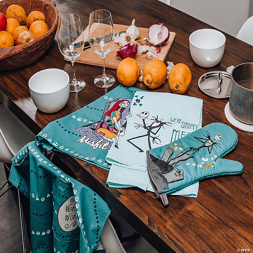 https://s7.orientaltrading.com/is/image/OrientalTrading/FXBanner_808/nightmare-before-christmas-kitchen-set-apron-mitt-pot-holders-towels~14369062-a03.jpg