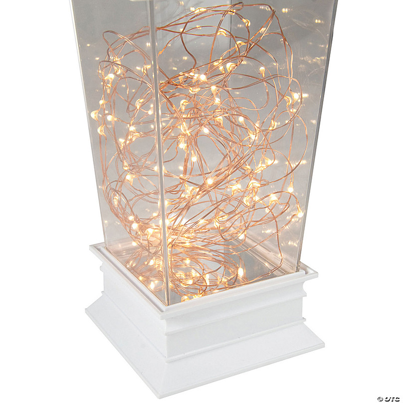 https://s7.orientaltrading.com/is/image/OrientalTrading/FXBanner_808/northlight-12-battery-operated-white-tapered-lantern-tabletop-decoration~14124117-a02.jpg