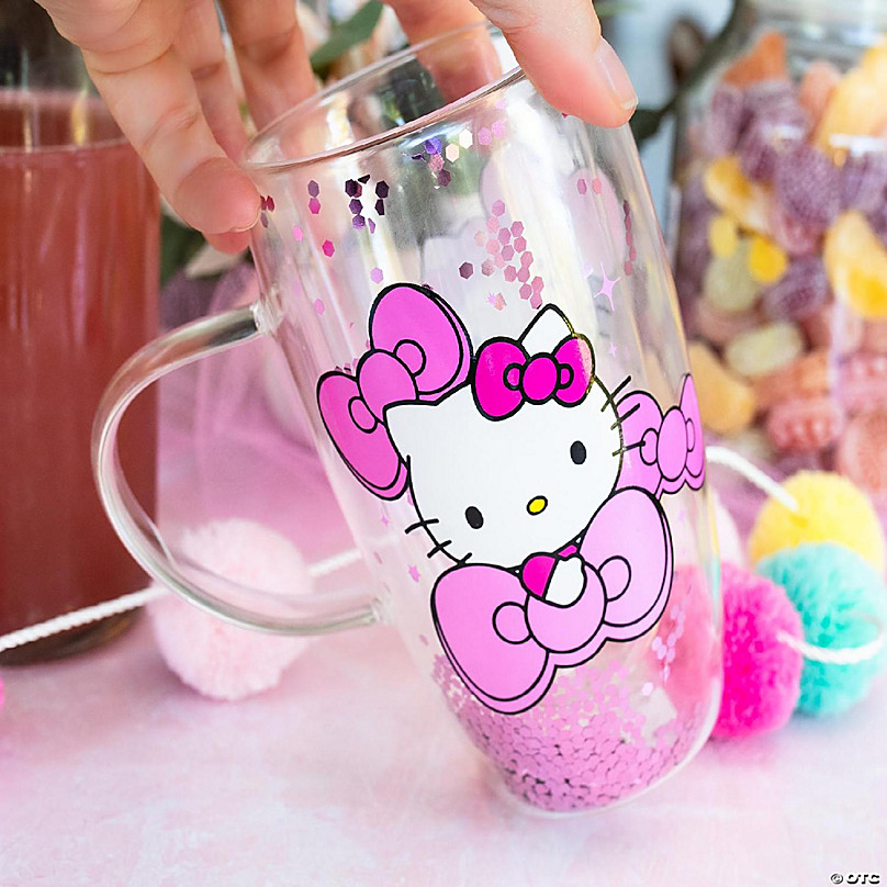 https://s7.orientaltrading.com/is/image/OrientalTrading/FXBanner_808/sanrio-hello-kitty-bows-and-stars-confetti-glass-mug-holds-15-ounces~14332374-a03.jpg