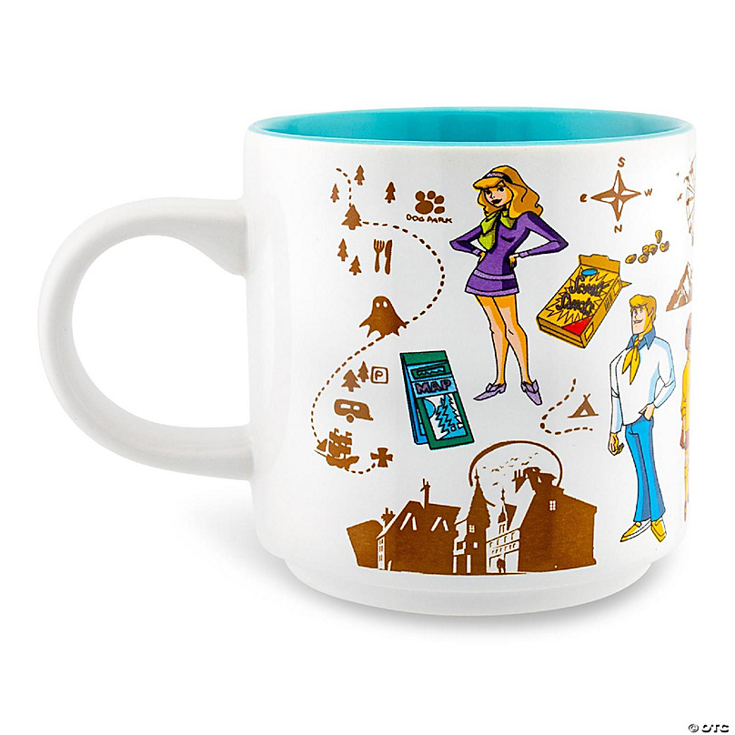 https://s7.orientaltrading.com/is/image/OrientalTrading/FXBanner_808/scooby-doo-and-the-gang-crystal-cove-ceramic-mug-holds-13-ounce~14438779-a02.jpg