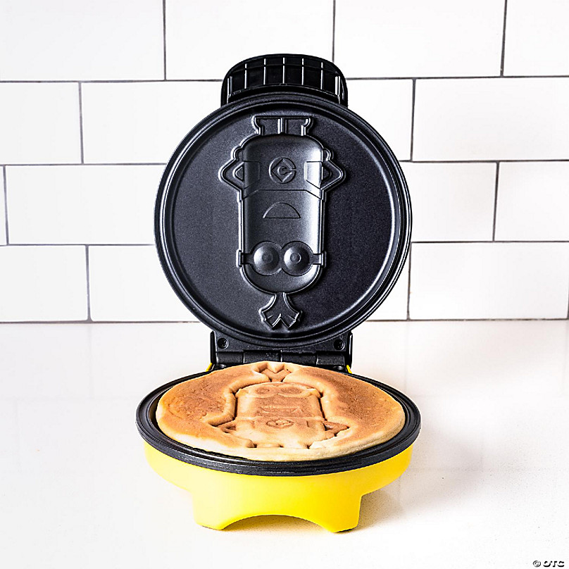 https://s7.orientaltrading.com/is/image/OrientalTrading/FXBanner_808/uncanny-brands-minions-kevin-waffle-maker-iconic-minion-on-your-waffles~14226678-a01.jpg