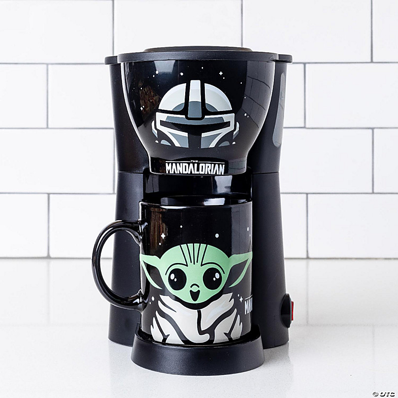 https://s7.orientaltrading.com/is/image/OrientalTrading/FXBanner_808/uncanny-brands-star-wars-mandolorian-single-cup-coffee-maker-with-mug~14244923-a02.jpg
