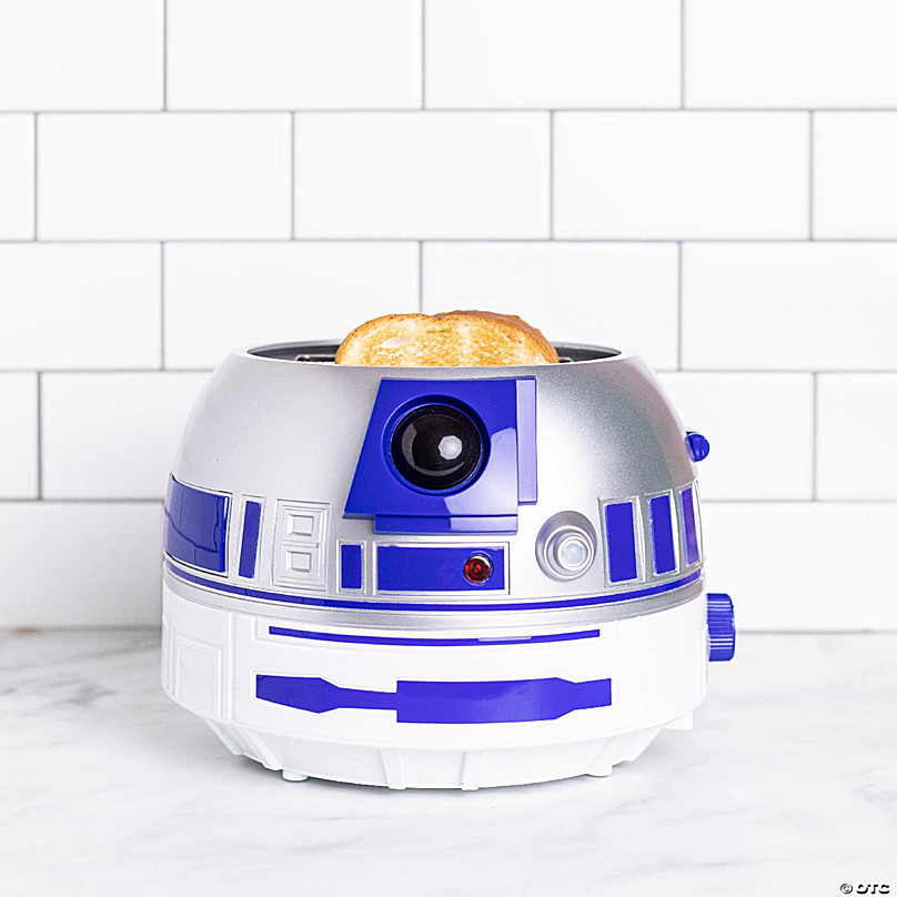 https://s7.orientaltrading.com/is/image/OrientalTrading/FXBanner_808/uncanny-brands-star-wars-r2-d2-deluxe-toaster-lights-up-and-makes-sounds-like-artoo~14226657-a02.jpg