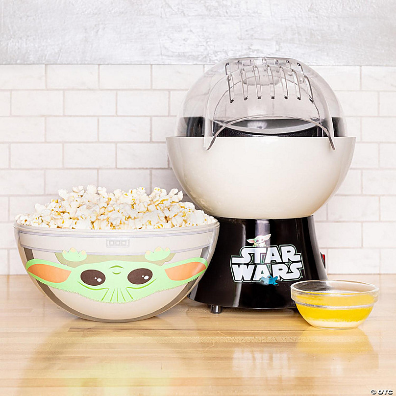 https://s7.orientaltrading.com/is/image/OrientalTrading/FXBanner_808/uncanny-brands-star-wars-the-mandalorian-popcorn-maker-baby-yoda-kitchen-appliance~14226666.jpg