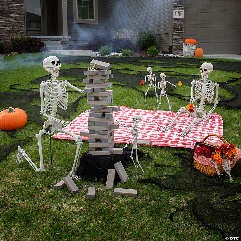 2 Ft. - 5 Ft. Posable Plastic Skeleton Family Halloween Decorating Kit - 5 Pc. Image