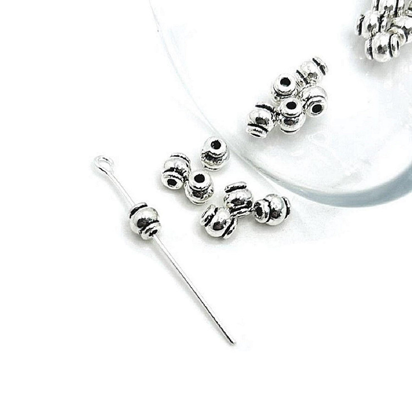 50 Pcs Small Silver Barrel Spacer Beads Image