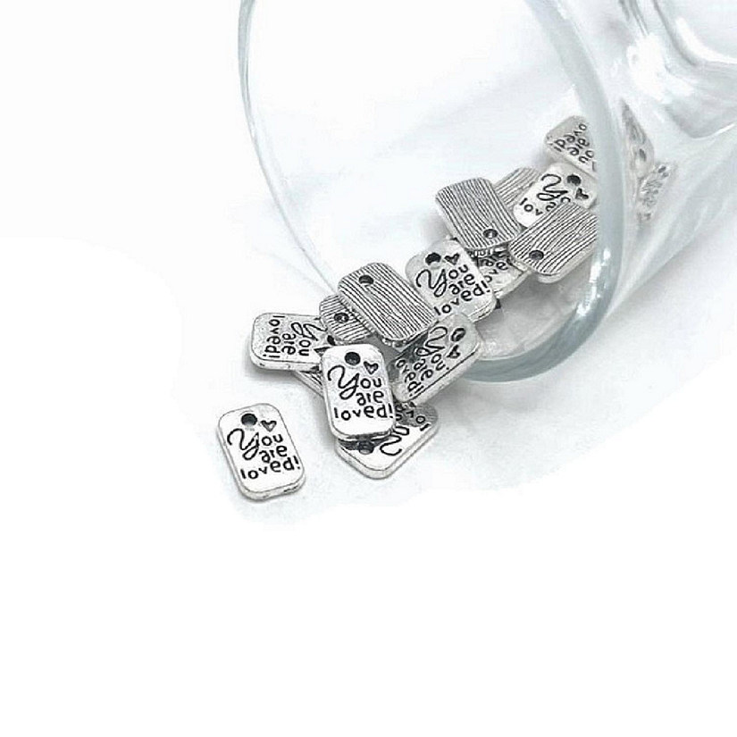 50 Pcs Tiny Silver You Are Loved Charms Image