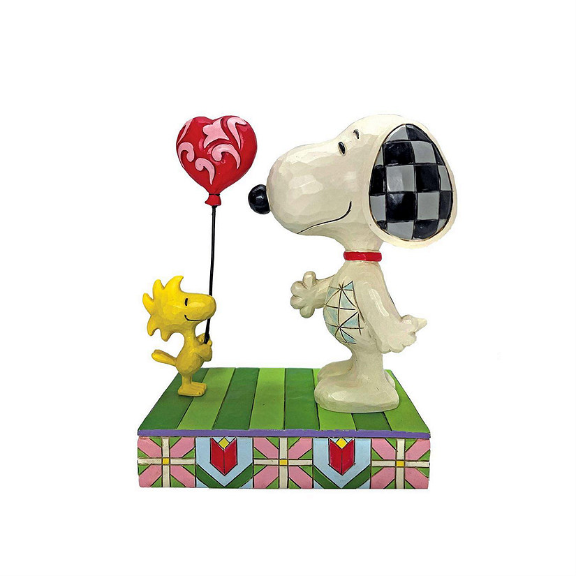 Jim Shore Peanuts Woodstock Giving Snoopy a Heart Figurine 5 Inch 6011948 Image