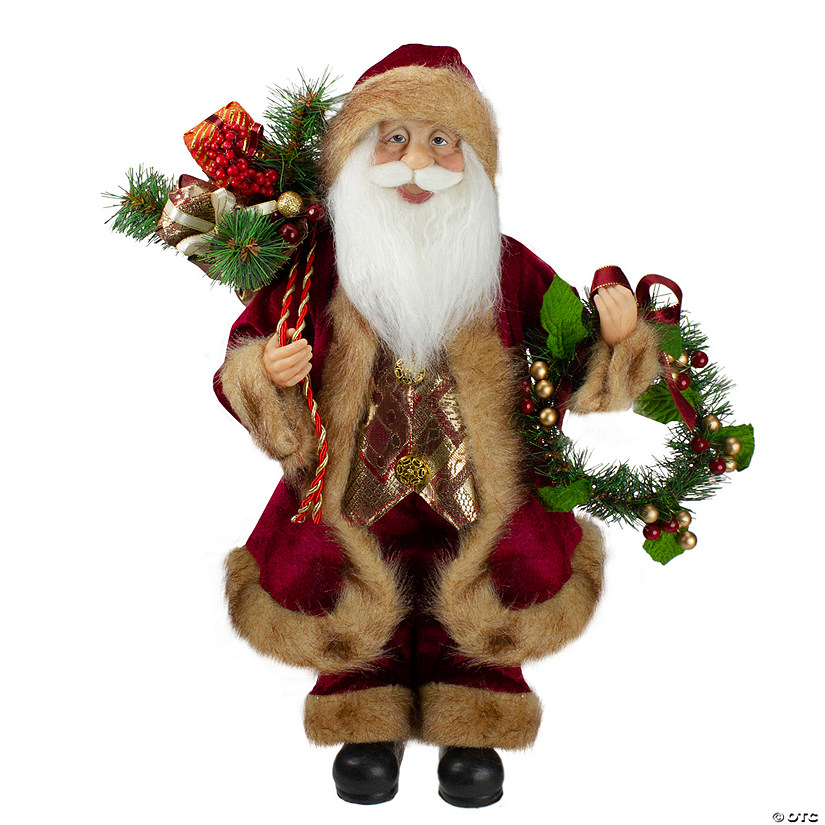 Northlight 18" Red Santa Claus Holding a Wreath and Gift Bag Christmas Figurine Image