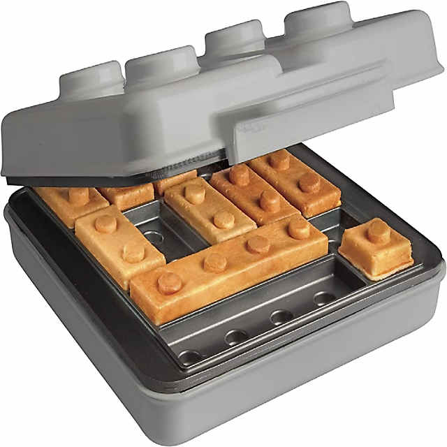 https://s7.orientaltrading.com/is/image/OrientalTrading/PDP_VIEWER_IMAGE_MOBILE$&$NOWA/building-brick-electric-waffle-maker-grey-with-2-construction-eating-plates~14386970-a01$NOWA$