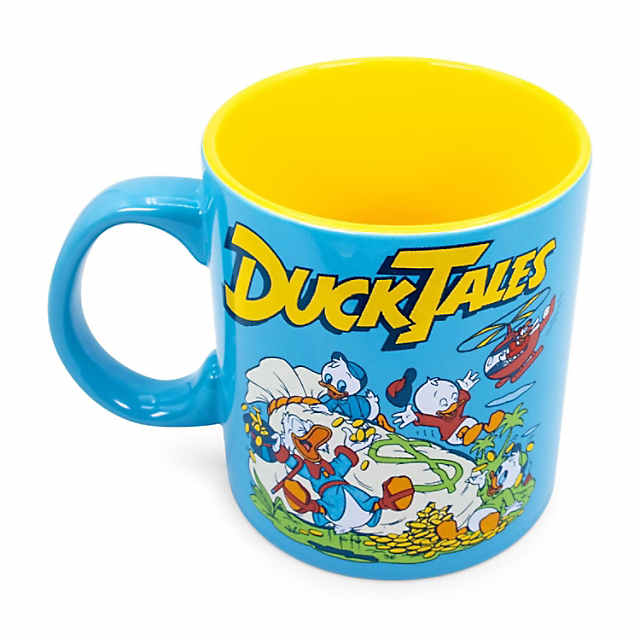 https://s7.orientaltrading.com/is/image/OrientalTrading/PDP_VIEWER_IMAGE_MOBILE$&$NOWA/disney-ducktales-money-bags-ceramic-mug-holds-20-ounces~14259887-a01$NOWA$