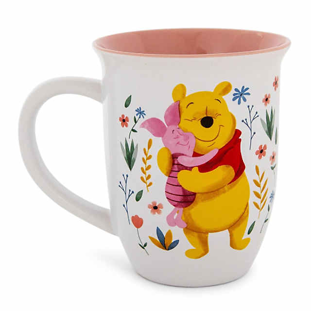 https://s7.orientaltrading.com/is/image/OrientalTrading/PDP_VIEWER_IMAGE_MOBILE$&$NOWA/disney-winnie-the-pooh-and-piglet-home-is-with-you-wide-rim-ceramic-mug~14439264-a01$NOWA$