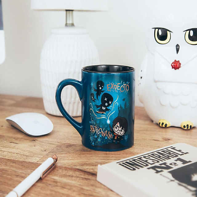 https://s7.orientaltrading.com/is/image/OrientalTrading/PDP_VIEWER_IMAGE_MOBILE$&$NOWA/harry-potter-chibi-expecto-patronum-ceramic-mug-holds-14-ounces~14352081-a01$NOWA$