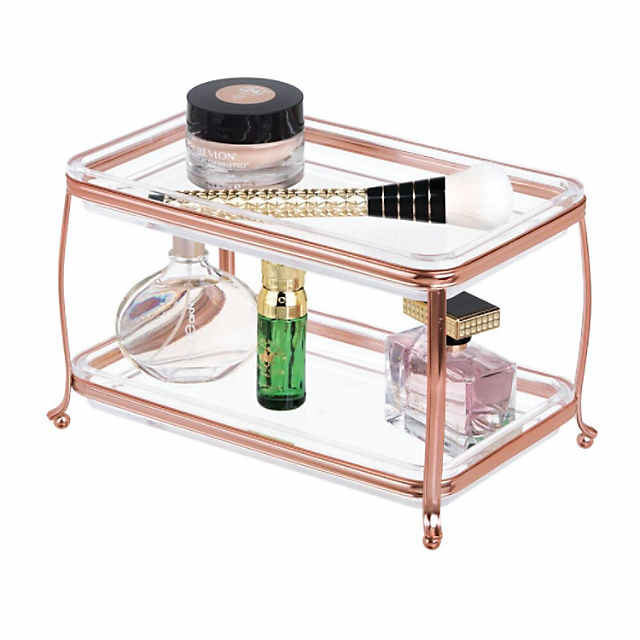 https://s7.orientaltrading.com/is/image/OrientalTrading/PDP_VIEWER_IMAGE_MOBILE$&$NOWA/mdesign-2-tier-bathroom-vanity-makeup-storage-organizer-tray-rose-gold-clear~14238257-a01$NOWA$