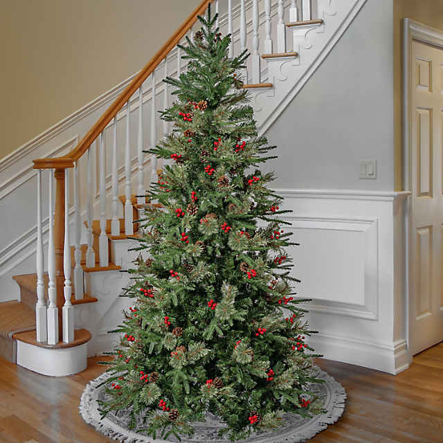 103, Christmas bells on a fir tree branch with pinecones