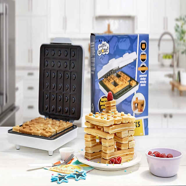 https://s7.orientaltrading.com/is/image/OrientalTrading/PDP_VIEWER_IMAGE_MOBILE$&$NOWA/waffle-wow-building-brick-electric-waffle-maker-cook-fun-buildable-waffles-pancakes-in-minutes-build-houses-cars-and-more-out-of-stackable-waffles~14380378-a01$NOWA$