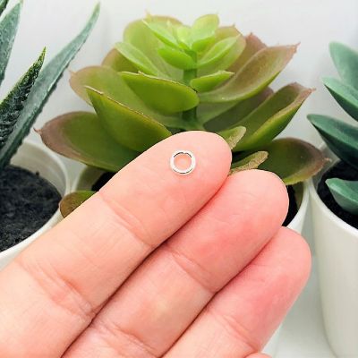 100 Pieces 5mm Silver Jump Rings Image 1