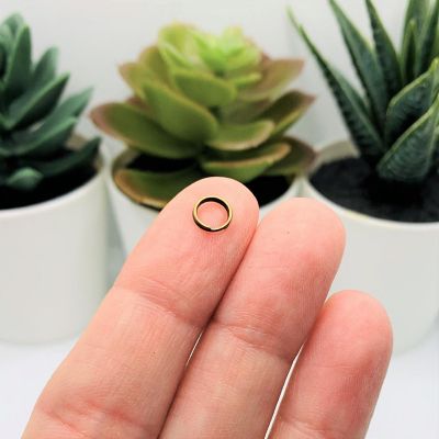 100 Pieces 6mm Bronze Split Jump Rings Image 1