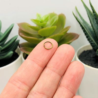 100 Pieces 7mm Bronze Jump Rings Image 1