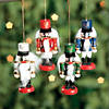 2 3/4" Nutcracker White, Red, Blue & Green Wood Christmas Ornaments - 12 Pc. Image 2