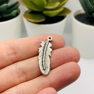 20 Antiqued Silver Feather Charms Image 1