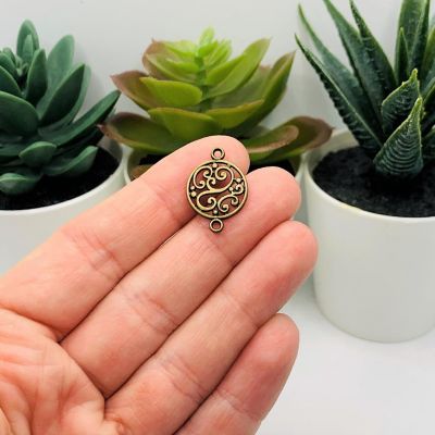 20 Pcs Bronze Filigree Scroll Connectors Image 1