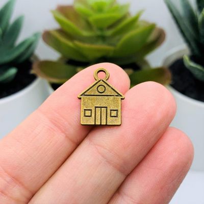 20 Pcs Bronze House Charms Image 1