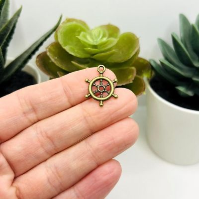 20 Pcs Bronze Ship Wheel Helm Charms Image 1