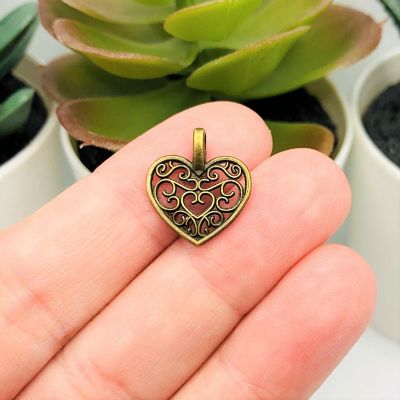 20 Pcs Filigree Scroll Heart Charms Image 1