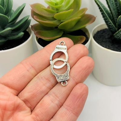 20 Pcs Silver Freedom Handcuff Charms Image 1