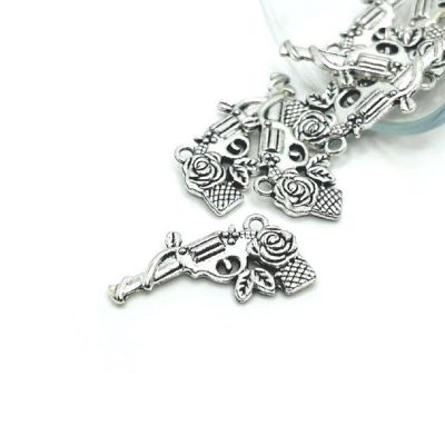 20 Pcs Silver Gun and Rose Charms Image 1