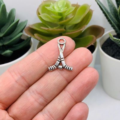 20 Pcs Silver Hockey Stick 3D Charms Image 1